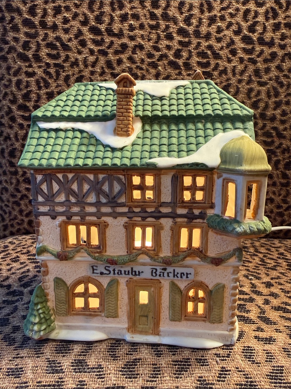 (Retired) Alpine Village. Handpainted Porcelain “E. Staubr Barker”.